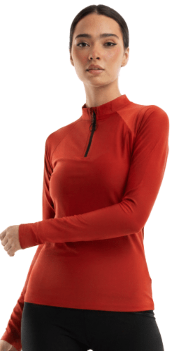 Brick red rashguard modest swimwear Dubai styled with swim leggings