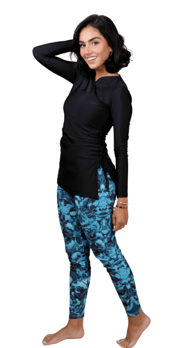 Printed bubble teal swim leggings styled with rashguard Bare Essentials Dubai