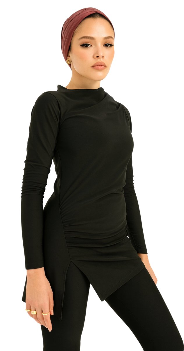 Modest black swim top with side ruching styled with swim leggings Dubai