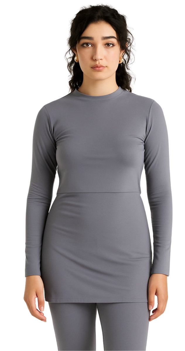 Modest grey high neck swim top styled with swim leggings Bare Essentials Dubai