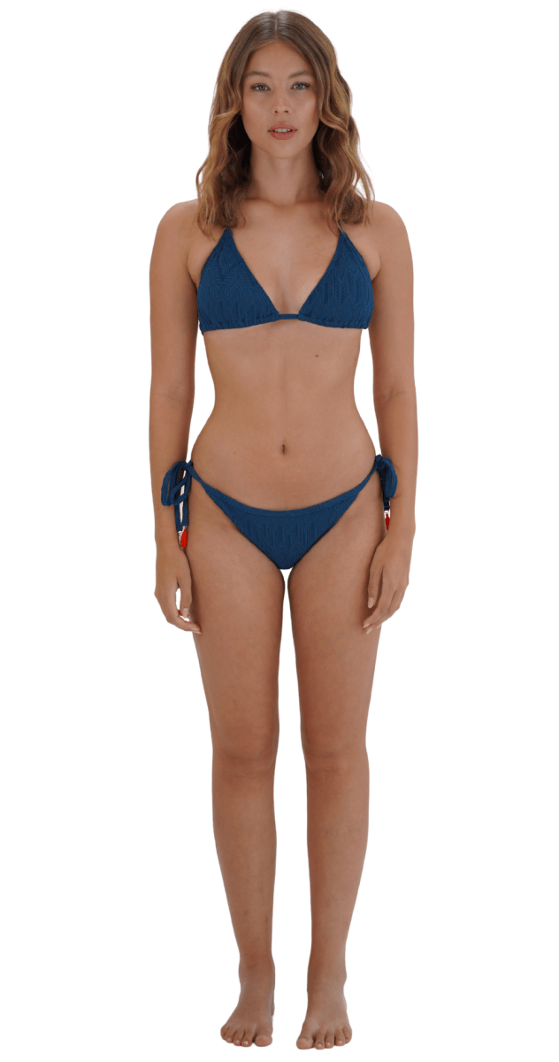 Model wearing Piha Gelato sliding triangle bikini blue Bare Essentials Swimwear Dubai